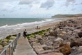 WISSANT, FRANCE Ã¢â¬â AUGUST 28, 2016: The beach with kite surfers. View with the Cap Blanc Nez in the background